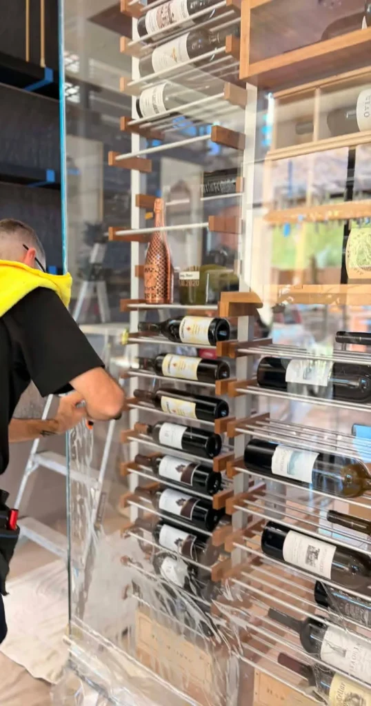 installing window film on Las Vegas wine cellar